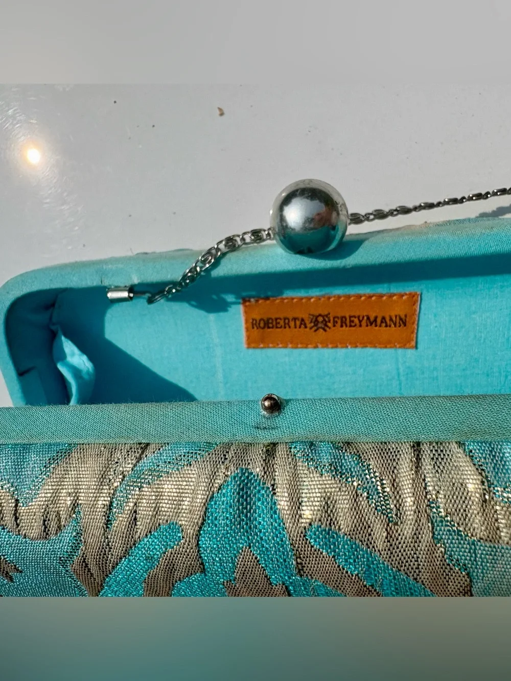 Roberta Freymann Turquoise and Gold Embossed Clutch/Chain Crossbody- Kiss lock